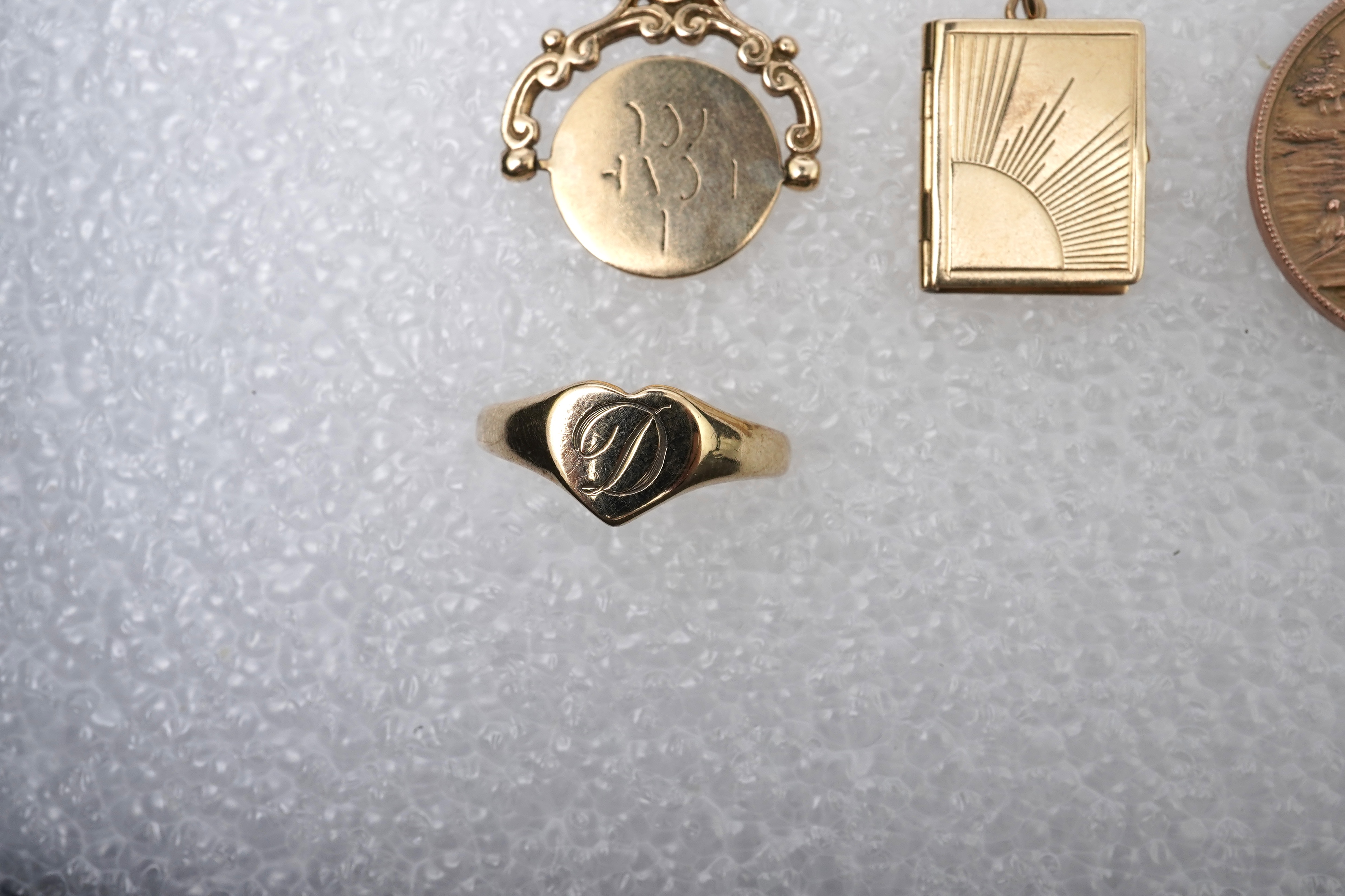 A modern 18ct gold and multi gem set cluster ring, size P, together with two 9ct rings including moss agate and a pair of 9ct gold and seed pearl set cabochon garnet ear studs.